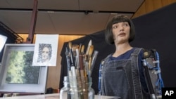 FILE- Humanoid robot Ai-Da at the ITU's 'AI for Good' Global Summit in Geneva, Switzerland, July 5 2023. Robotics innovators, their creations joined diplomats in Geneva from July 6-7.