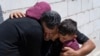 Mourners cry after taking a last look at the body of Qusai Matan during his funeral in the West Bank village of Burqa on Aug. 5, 2023. The Palestinian Health Ministry said that armed Israeli settlers shot and killed the 19-year-old.
