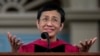 FILE - Keynote speaker Maria Ressa, a journalist and advocate for freedom of the press, addresses graduates in Harvard Yard during commencement at Harvard University, May 23, 2024, in Cambridge, Massachusetts.