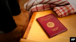 FILE - A passport of an Ethiopian citizen is seen at a residence in Tok Mok, Kyrgyzstan, Aug. 16, 2010. The European Union is tightening visa requirements for people from Ethiopia, it was reported on April 29, 2024.