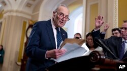FILE - Senate Majority Leader Chuck Schumer, D-N.Y., addresses reporters at the Capitol in Washington, May 21, 2024.