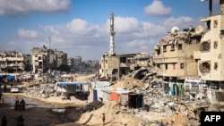 Tents are set up by displaced Palestinians amid the devastation in Khan Yunis in the southern Gaza Strip on May 16, 2024.