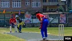 Batsman intends to play an aggressive shot at a sports ground in the Redpora area of Srinagar on the Indian side of Kashmir. (Wasim Nabi/VOA) 