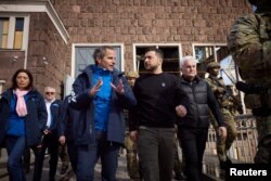 FILE - International Atomic Energy Agency Director General Rafael Grossi speaks to Ukraine's President Volodymyr Zelenskyy, in Zaporizhzhia, Ukraine, March 27, 2023. (Ukrainian Presidential Press Service/Handout via Reuters)