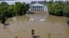 Будинок культури у затопленій Новій Каховці після прориву дамби. Херсонська область, 6 червня 2023 року. Фото: Alexey Konovalov/TASS/via REUTERS 
