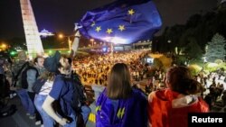 Demonstrators hold a rally to protest against a bill on registration of "foreign agents," in Tbilisi, Georgia, May 2, 2024.