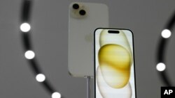 FILE - The iPhone 15 phones are shown during an announcement of new products on the Apple campus in Cupertino, Calif., Sept. 12, 2023. 