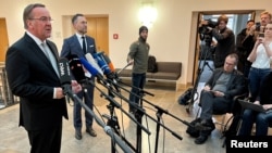 German Defense Minister Boris Pistorius makes a statement in Berlin, Germany, March 3, 2024, on an apparent eavesdropping incident, after Moscow said a recording of German officers showed them discussing weapons for Ukraine and a potential strike by Kyiv on a bridge in Crimea.