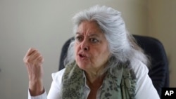 FILE - Mahbouba Seraj, a women's rights activist, gives an interview to The Associated Press in Kabul, Afghanistan, April 24, 2021.