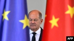FILE - German Chancellor Olaf Scholz arrives to address a joint press conference with China's premier (not pictured) on June 20, 2023, at the Chancellery in Berlin.