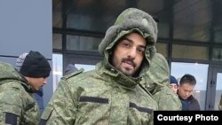 This undated photo shows Mohammad Asfan, 30, who died on the front lines of Russia's war on Ukraine. He was “duped” into joining the Russian army by a Dubai-based agent, his brother says. (Asfan family photo)