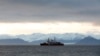 FILE - The Canadian Coast Guard ship Des Groseilliers is seen near the arctic community of Pond Inlet, Nunavut, Aug. 23, 2014.