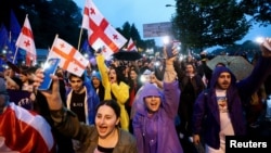 Demonstrators rally to protest a bill on "foreign agents" in Tbilisi, Georgia, May 11, 2024. 