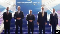 From left, Montenegro's Prime Minister Milojko Spajic, Serbia's President Aleksandar Vucic, North Macedonia's Prime Minister Dimitar Kovacevski, Albania's Prime Minister Edi Rama and Kosovo's Prime Minister Albin Kurti meet in Skopje, North Macedonia, Jan. 22, 2024. 