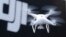 FILE - A Phantom 4, developed by Chinese consumer drone maker DJI, is pictured during a demonstration flight in Tokyo, March 3, 2016. Washington, Beijing and Taipei are working to improve the sophistication, adaptability and cost of drone technology.