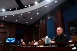 FILE - Ukrainian Prosecutor General Andriy Kostin testifies before U.S. lawmakers April 19, 2023, in Washington. He described horrifying examples of atrocities that he said were deliberately orchestrated by Russian forces to sow fear among civilians.