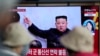 A TV screen is seen reporting North Korea's missile launch with a file image of North Korean leader Kim Jong Un during a news program at the Seoul Railway Station in Seoul, South Korea, April 13, 2023. 