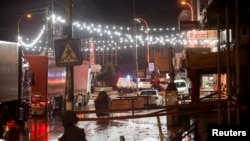 An Israeli troop stands guard, at the scene of a shooting, in Huwara, in the Israeli-occupied West Bank, March 19, 2023.