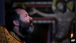 Russian Orthodox Priest the Rev. Andrei Kordochkin attends a service at the Russian Cathedral of Saint Mary Magdalene in Madrid, Spain, July 15, 2023.
