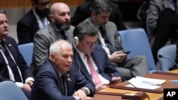 FILE - Josep Borrell, High Representative of the European Union for Foreign Affairs and Security Policy, left, speaks during a Security Council meeting at United Nations headquarters, Feb. 24, 2023. The EU agreed Saturday to new sanctions on Russia over its invasion of Ukraine. 