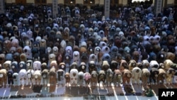 Muslim devotees offer Eid al-Adha prayers at Hazrat-e- Omar mosque in Kandahar, Afghanistan, June 17, 2024. 