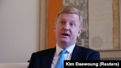 FILE - British Deputy Prime Minister Oliver Dowden speaks during an interview with Reuters, in Seoul, South Korea, March 19, 2024.