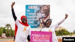 Gambian activists Rohey Cham and Sainabou Sey celebrate after the country's parliament rejected the bill to end a ban on female genital mutilation (FGM) in Banjul, Gambia, July 15, 2024.