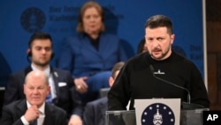 Ukrainian President Volodymyr Zelenskyy delivers a speech after he received the Charlemagne Prize for Services to European Unity in Aachen, Germany, May 14, 2023. 