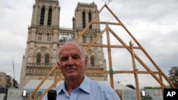 FILE - General Jean-Louis Georgelin attends an interview in front of Notre Dame Cathedral in Paris, France, Sept. 19, 2020. He has died at age 74.