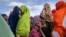 FILE - Somali women are seen at a camp for displaced people on the outskirts of Dollow, Somalia, Sept. 19, 2022. Various forms of gender-based violence are prevalent in Somalia. The situation is worsened by the absence of strong legal frameworks to deter attacks.