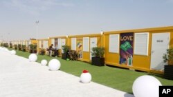 FILE - Cabins line the World Cup fan village, Nov. 10, 2022, in Doha, Qatar. 