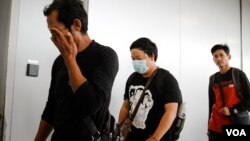 Thai nationals arrive in Bangkok, Thailand, Oct. 12 2023. More than 5,000 Thai workers in Israel have requested to return to Thailand. (Tommy Walker/VOA)