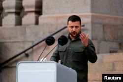 Ukrainian President Volodymyr Zelenskyy addresses the people in front of the Danish Parliament, in Copenhagen, Denmark, August 21, 2023. (Ritzau Scanpix/Thomas Traasdahl via Reuters)