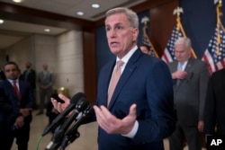 FILE - U.S. Speaker of the House Kevin McCarthy and Republican leaders meet with reporters following a closed-door briefing on the budget to be submitted by President Joe Biden, at the Capitol in Washington, March 8, 2023.