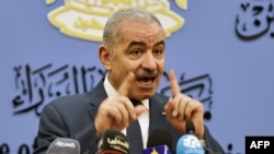 Palestinian Prime Minister Mohammad Shtayyeh speaks during a press conference after several key donor countries halted funding to the United Nations Relief and Works Agency for Palestine Refugees (UNRWA), in Ramallah, Jan. 28, 2024.