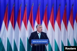 FILE - Hungarian Prime Minister Viktor Orban delivers his annual State of the Nation speech, in Budapest, Hungary, Feb. 18, 2023.