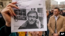Fotografija Slavka Ćuruvije, ubijenog u aprilu 1999. u Beogradu (Foto: (AP/Darko Vojinovic)