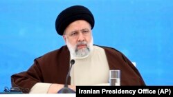 President Ebrahim Raisi attends the inauguration ceremony of dam of Qiz Qalasi, or Castel of Girl in Azeri, at the border of Iran and Azerbaijan with his Azeri counterpart Ilham Aliyev, May 19, 2024. 