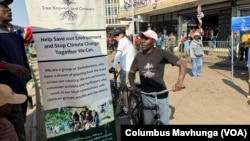 Segio Tarwirei, who works for a local NGO called Tree Knowers and Growers, bikes in Harare, June 3, 2024. He cycles daily and encourages Zimbabweans to join him.