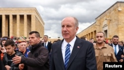 FILE - Presidential candidate in May elections and Homeland Party's leader Muharrem Ince visits Anitkabir, the mausoleum of modern Turkey's founder Mustafa Kemal Ataturk, with his supporters in Ankara, Turkey, April 5, 2023.