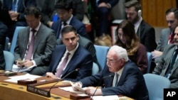 Palestinian Foreign Minister Riyad Al-Maliki, bottom right, speaks during a Security Council meeting at United Nations headquarters, Oct. 24, 2023.