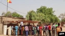 Voters queue at the Walia high school polling station in N'Djamena on May 6, 2024 during Chad's presidential election.