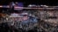 FILE - Participants stand for the signing of the national anthem before the start of the second day session of the Democratic National Convention in Philadelphia, July 26, 2016.