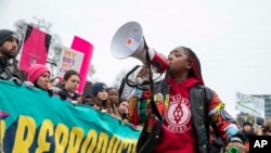 FILE - Demonstrators rally for reproductive rights in front of the White House in Washington, during the Women's March, on Jan. 22, 2023.