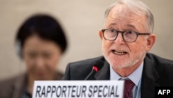 FILE - Special rapporteur on the human rights situation in Afghanistan Richard Bennett delivers his report during a U.N. Human Rights Council session in Geneva, Switzerland, March 6, 2023.