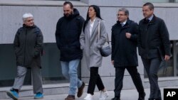 Spanish soccer player Jenni Hermoso, center, arrives at the Audiencia Nacional court, in Madrid, Spain, Jan. 2, 2024.