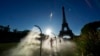 Paris Olympics brings out hoses and misters to cool down fans during heat wave