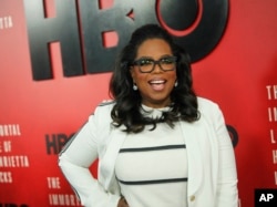 FILE - Oprah Winfrey attends the premiere of HBO Films' 'The Immortal Life of Henrietta Lacks'" at the SVA Theatre in New York, Apr. 18, 2017. (Photo by Andy Kropa/Invision/AP)