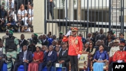 FILE - General Brice Oligui Nguema (C), who was inaugurated as Gabon's interim president, gives a salute during a military parade in Libreville, Sept. 4, 2023.
