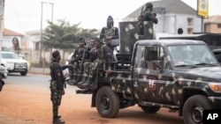 FILE - Military forces secure an area in Anambra, Nigeria, Feb. 24, 2023. On May 16, 2023, armed men attacked a U.S. embassy convoy in southeast Anambra state.